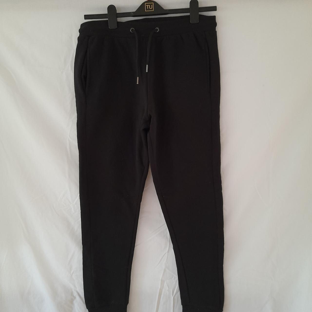 Skinny fit black jogging bottoms - Depop