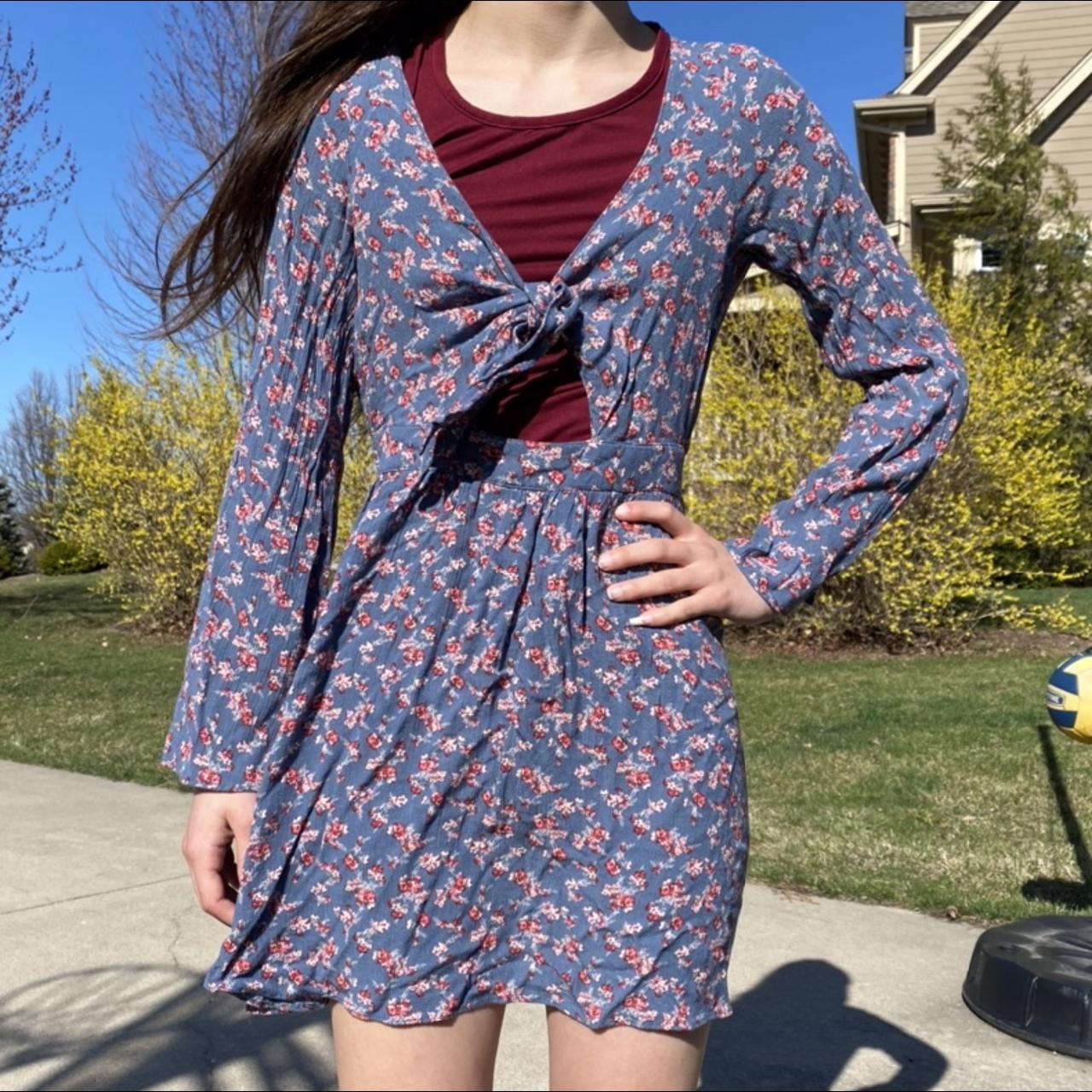 Blue floralpatterned partial wrap dress with long... Depop