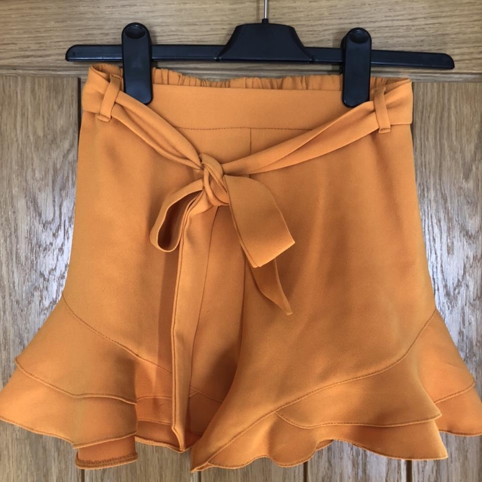 river island orange shorts