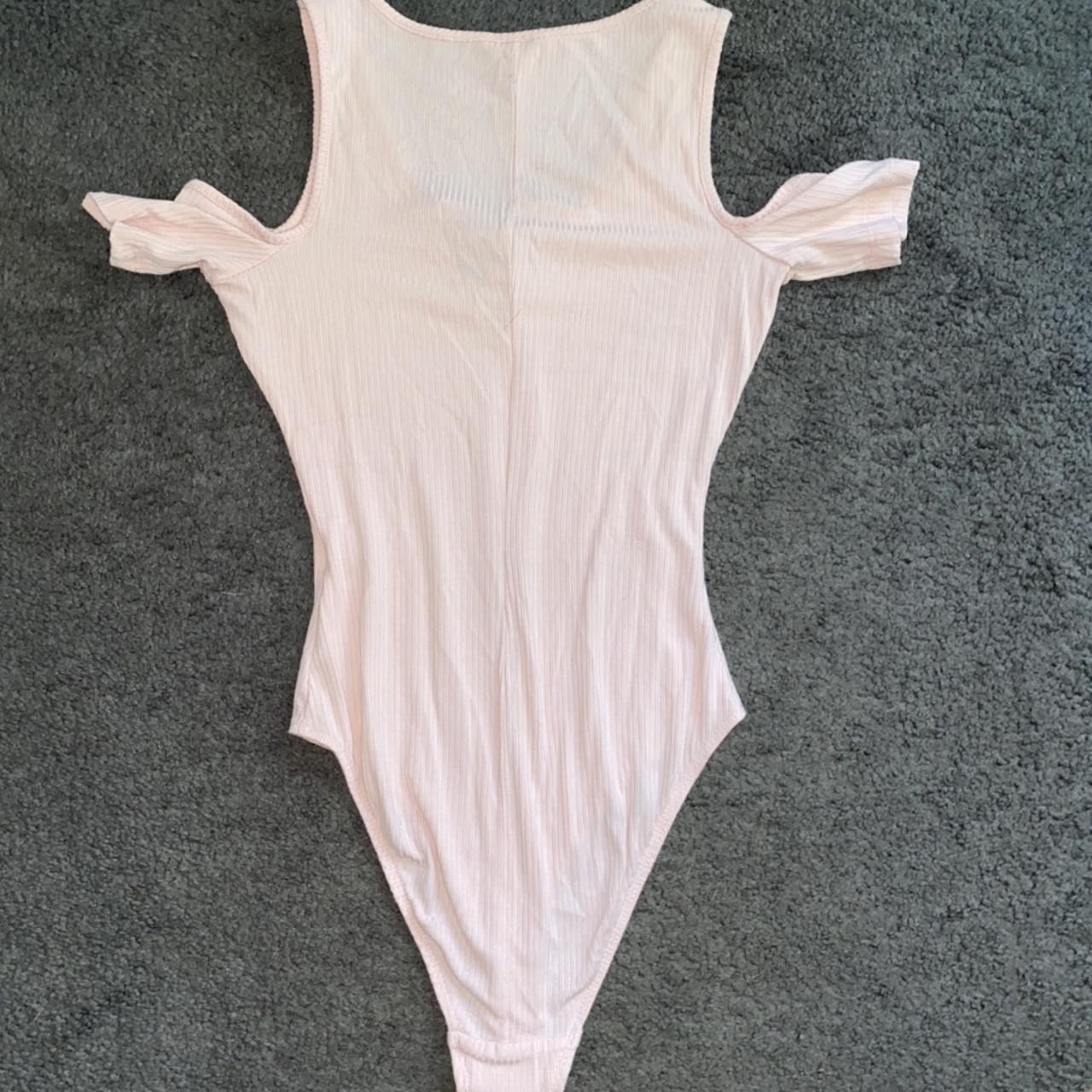 pink bodysuit by candies! no flaws. modeled on size... Depop