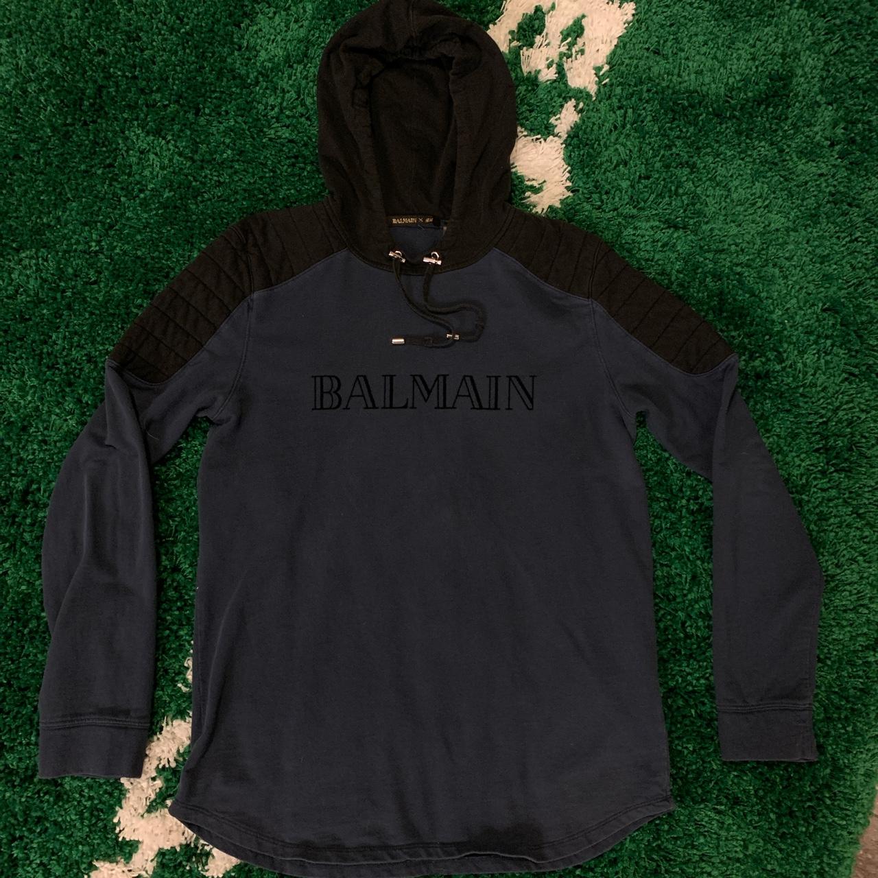 balmain star sweatshirt Cinosural International School