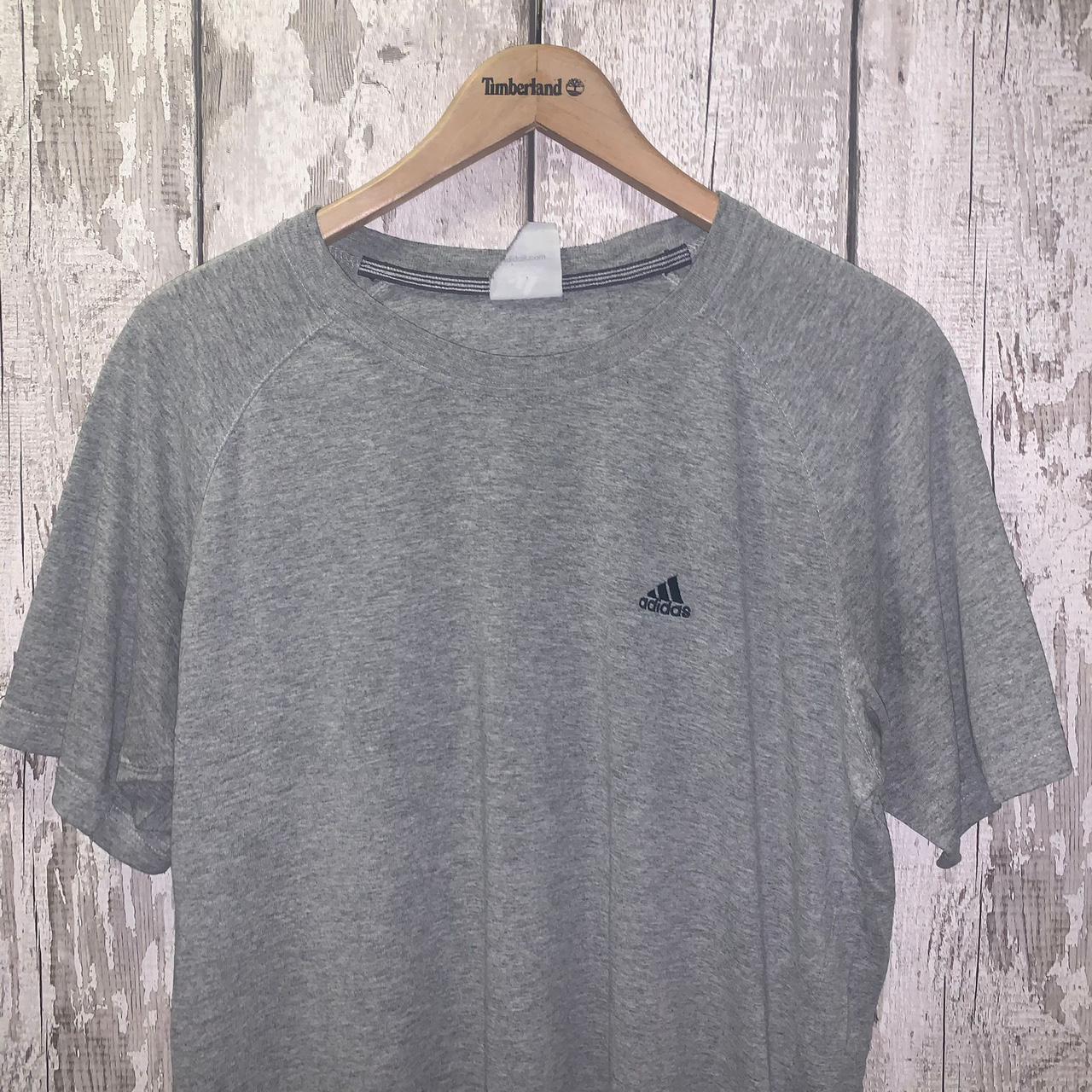 Vintage plain grey Adidas t shirt featuring the... - Depop