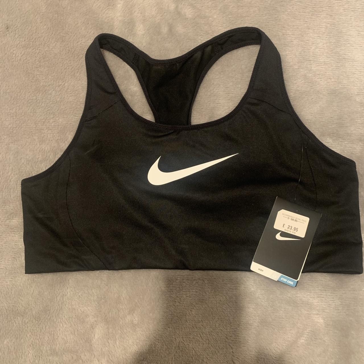 Nike sports bra. Sold as an xl but it fits really - Depop