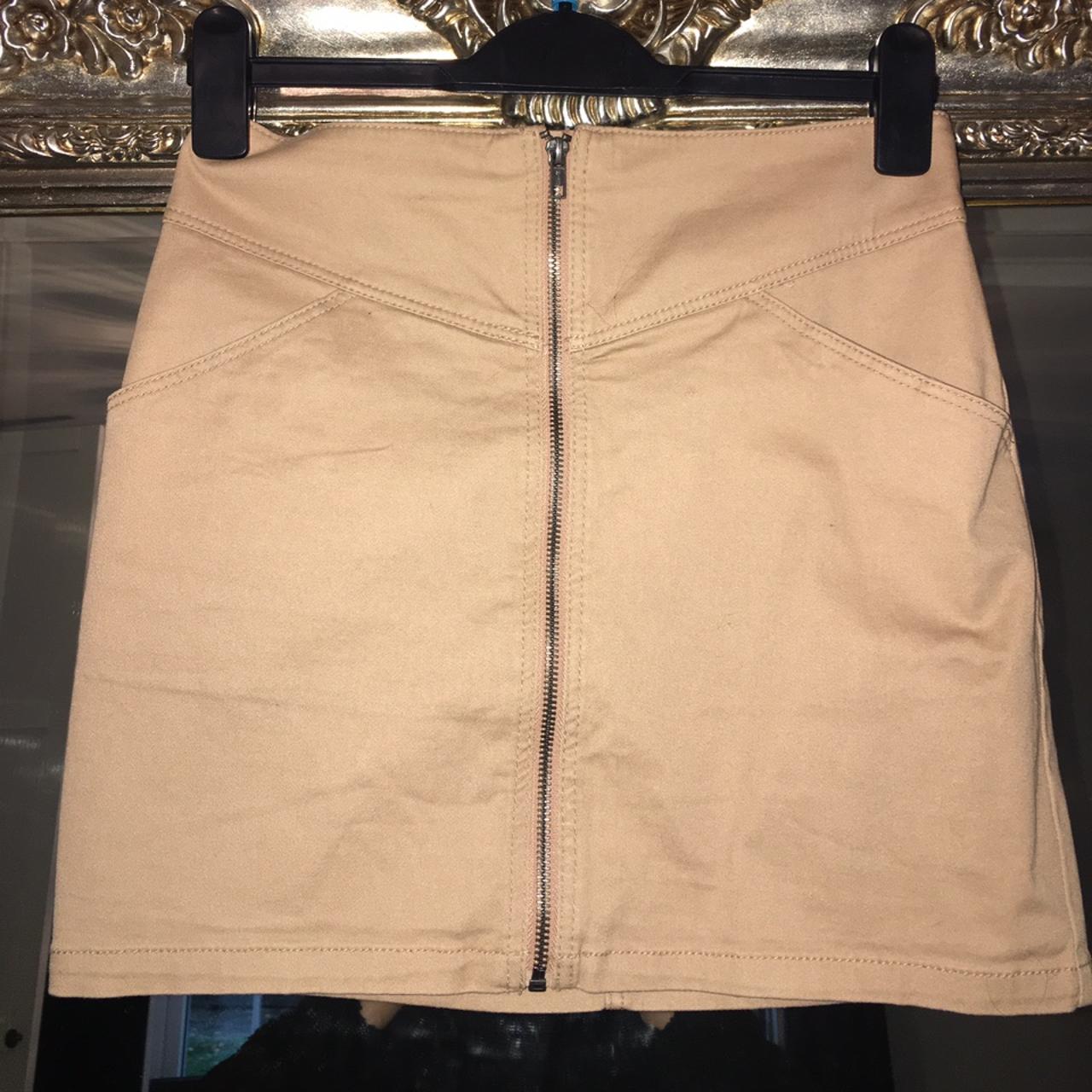 Great looking Camel coloured zip through skirt. Fits... - Depop