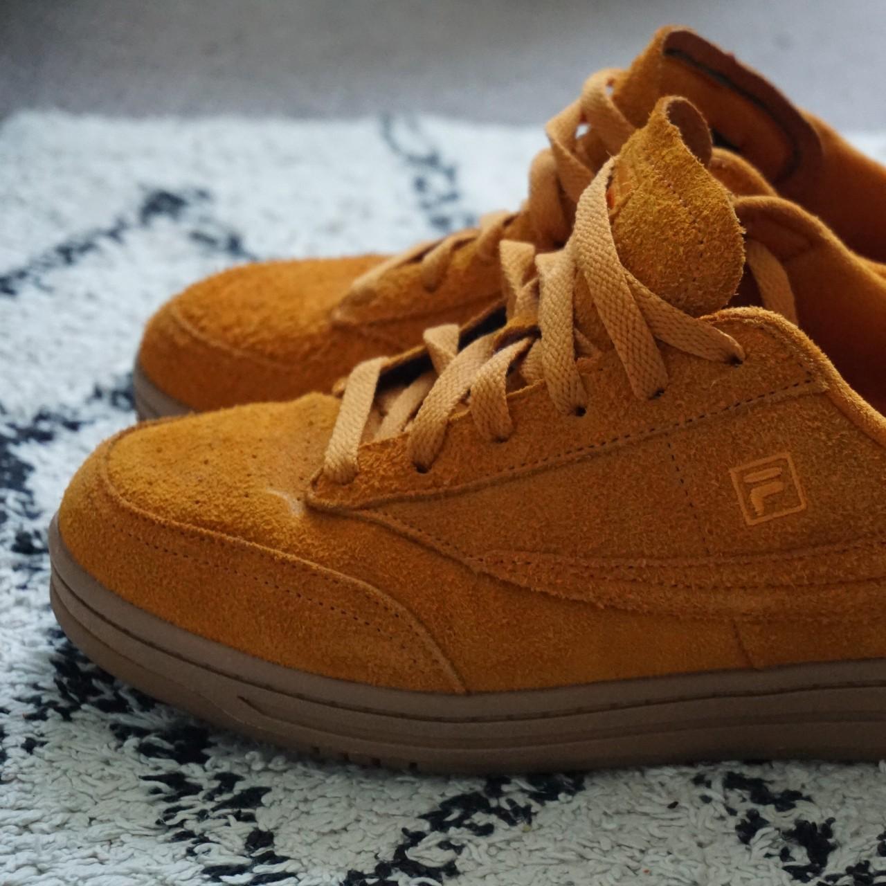 fila black and orange shoes