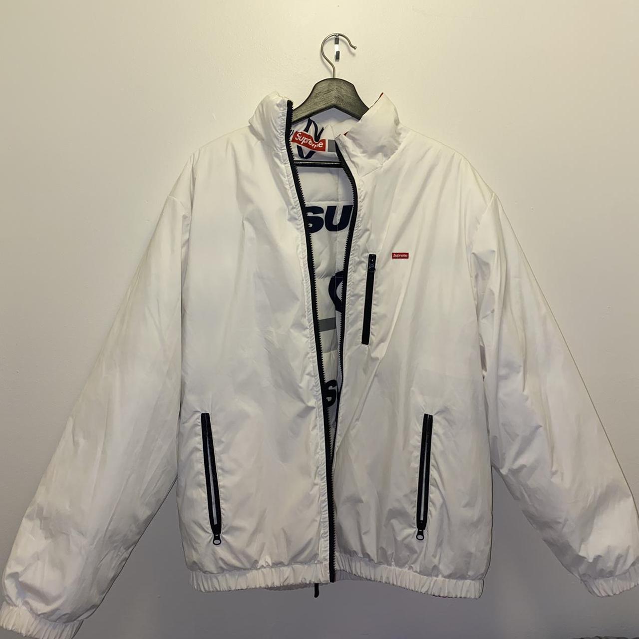 Supreme ny reversible hot sale puffy jacket white