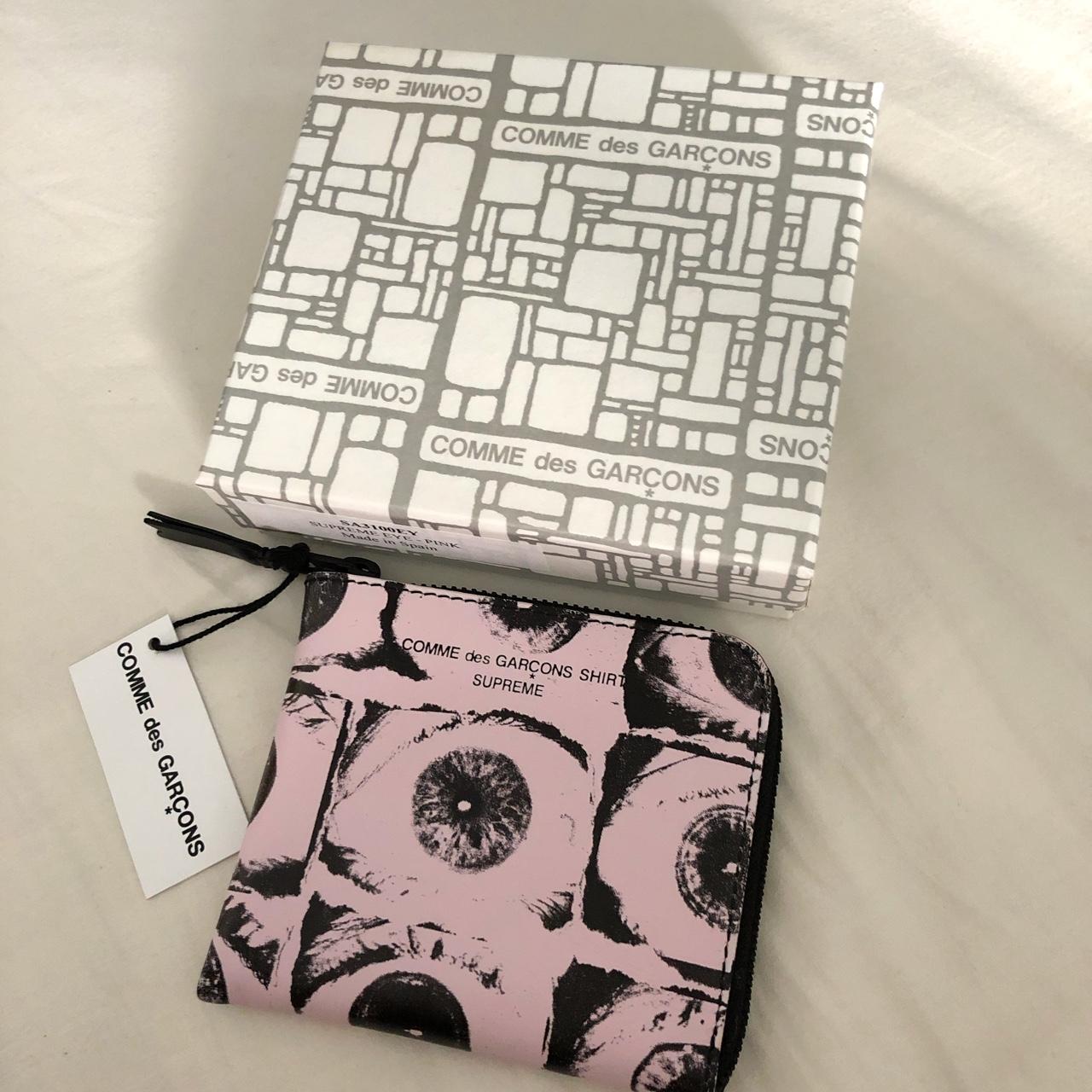 Cdg x supreme wallet best sale