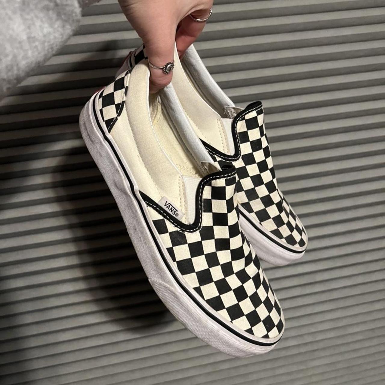 Vans classic checkerboard slip on. Worn less than 10