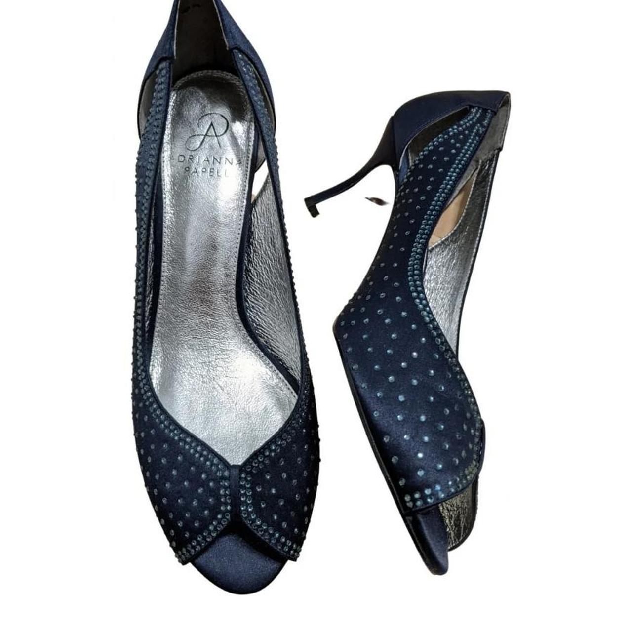 Navy with rhinestones open toe heels. 7 inch heel