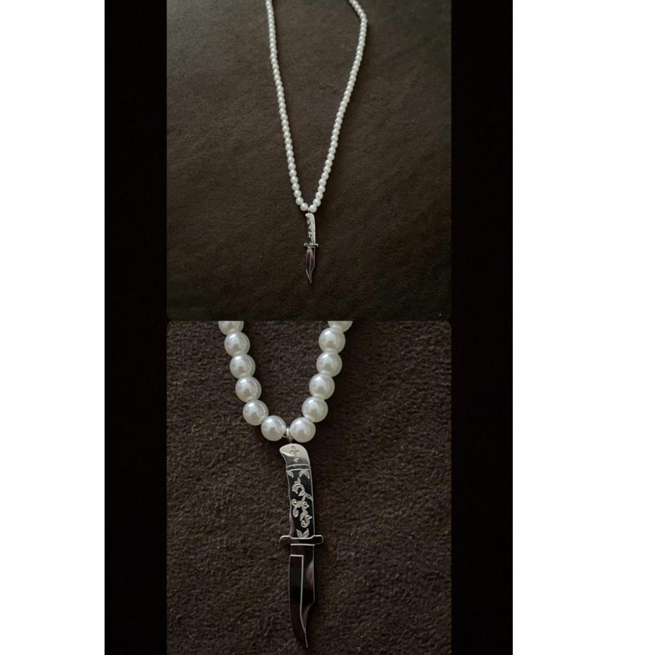 Elita Harkov’s jewelry: unisex silver pearl knife...