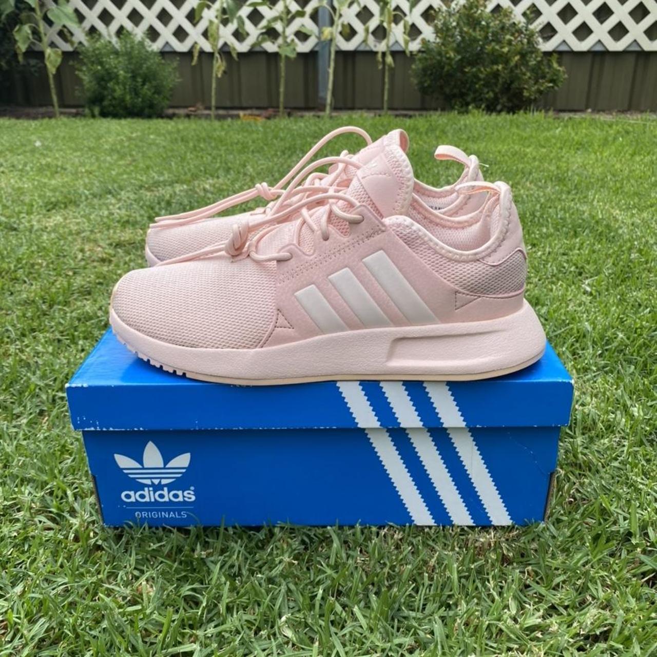 Pink adidas outlet footlocker