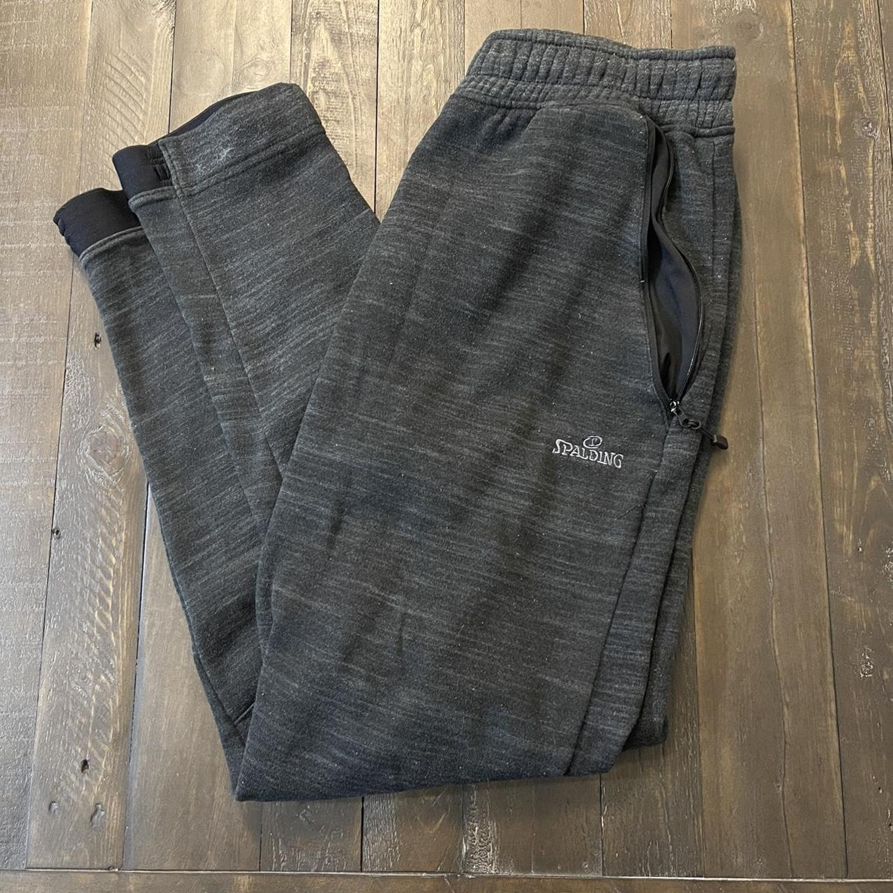 Spalding Sweatpants with zipper pockets. Mens size... - Depop