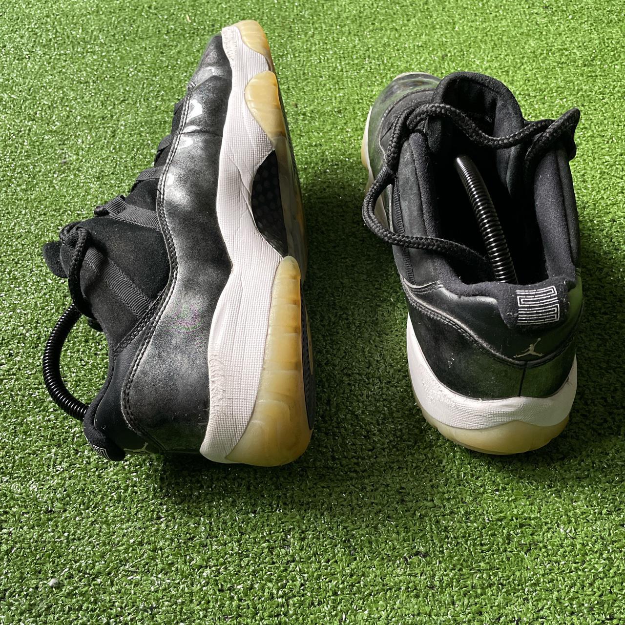 jordan 11 low barons black