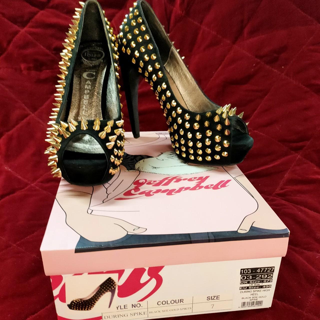 Black heels with gold sales spikes