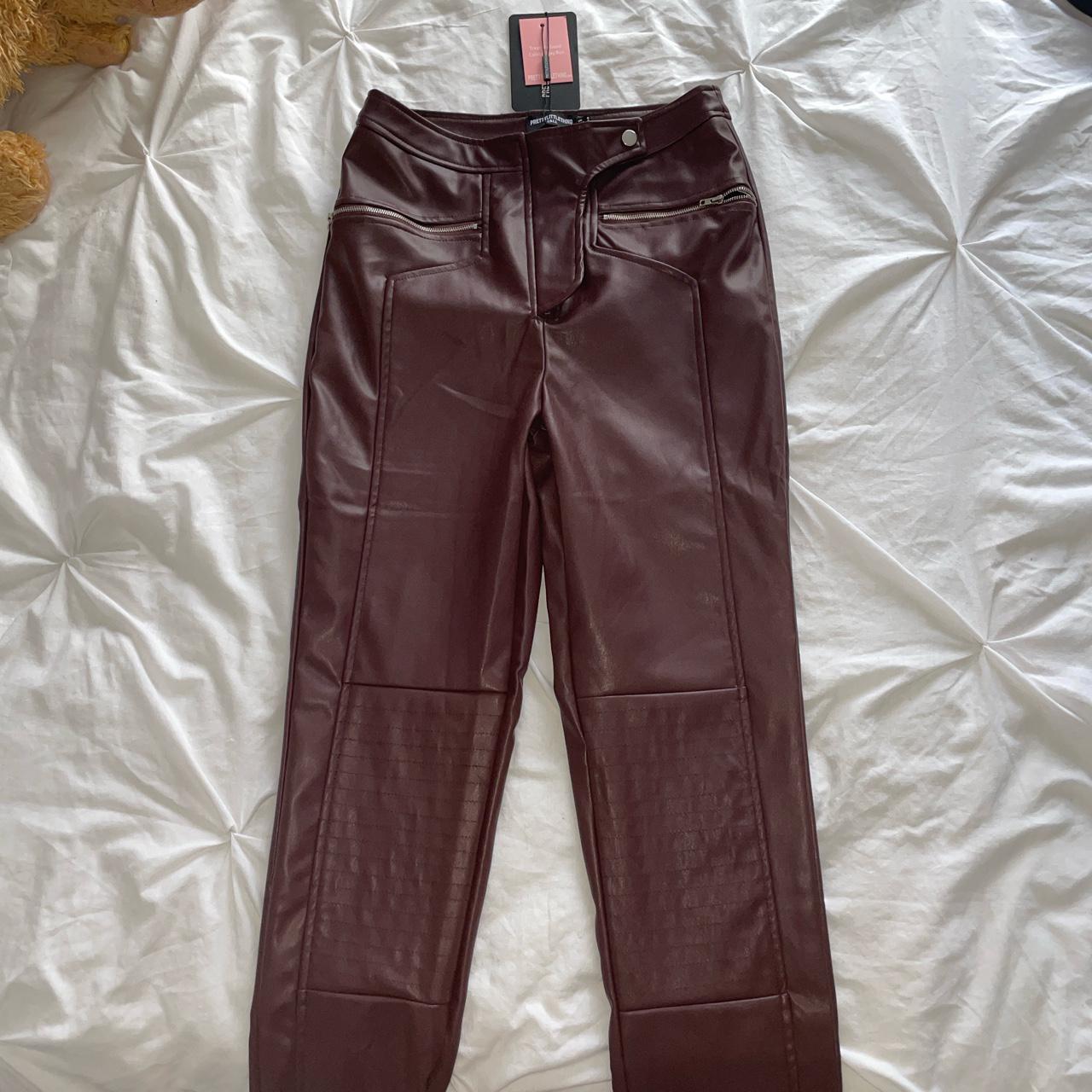 tall brown leather trousers