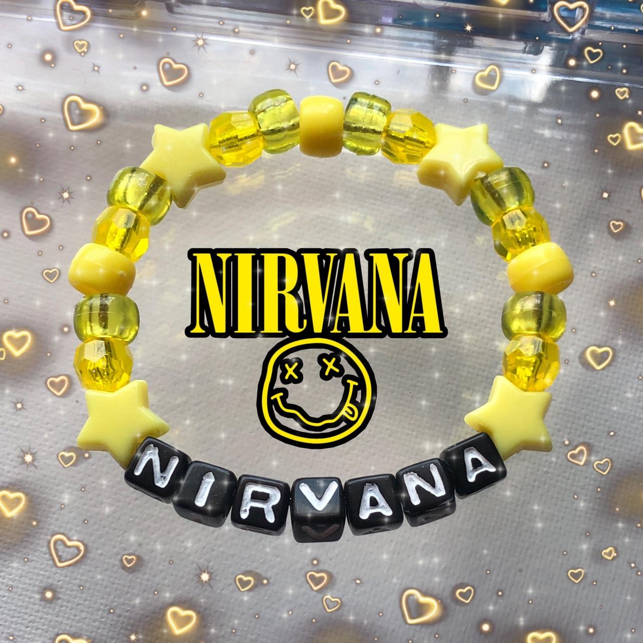 Handmade Nirvana Kandi Bracelet 💛🖤 pm for... - Depop