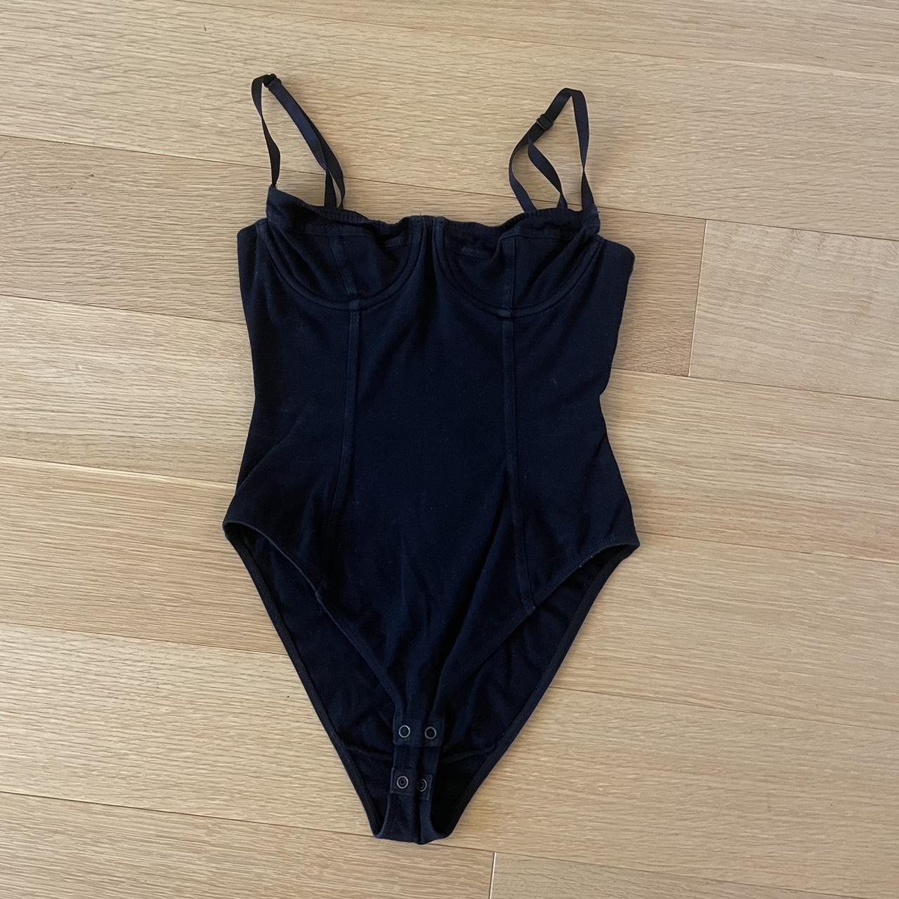 Black bodysuit with built in cups! It is a size... Depop