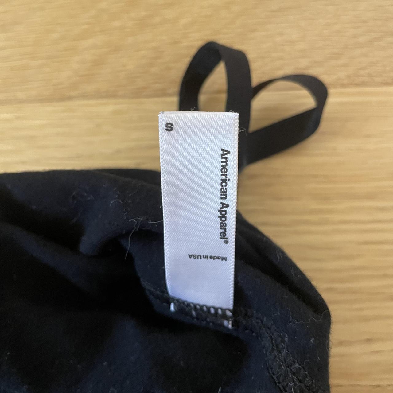 Black bodysuit with built in cups! It is a size... Depop