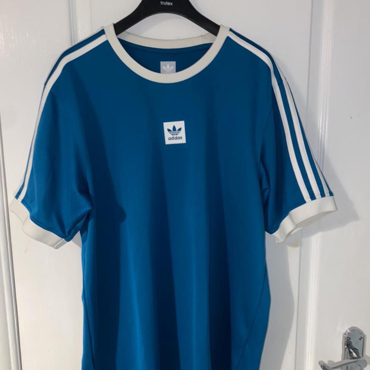 Teal adidas three stripe tshirt. Football shirt... - Depop