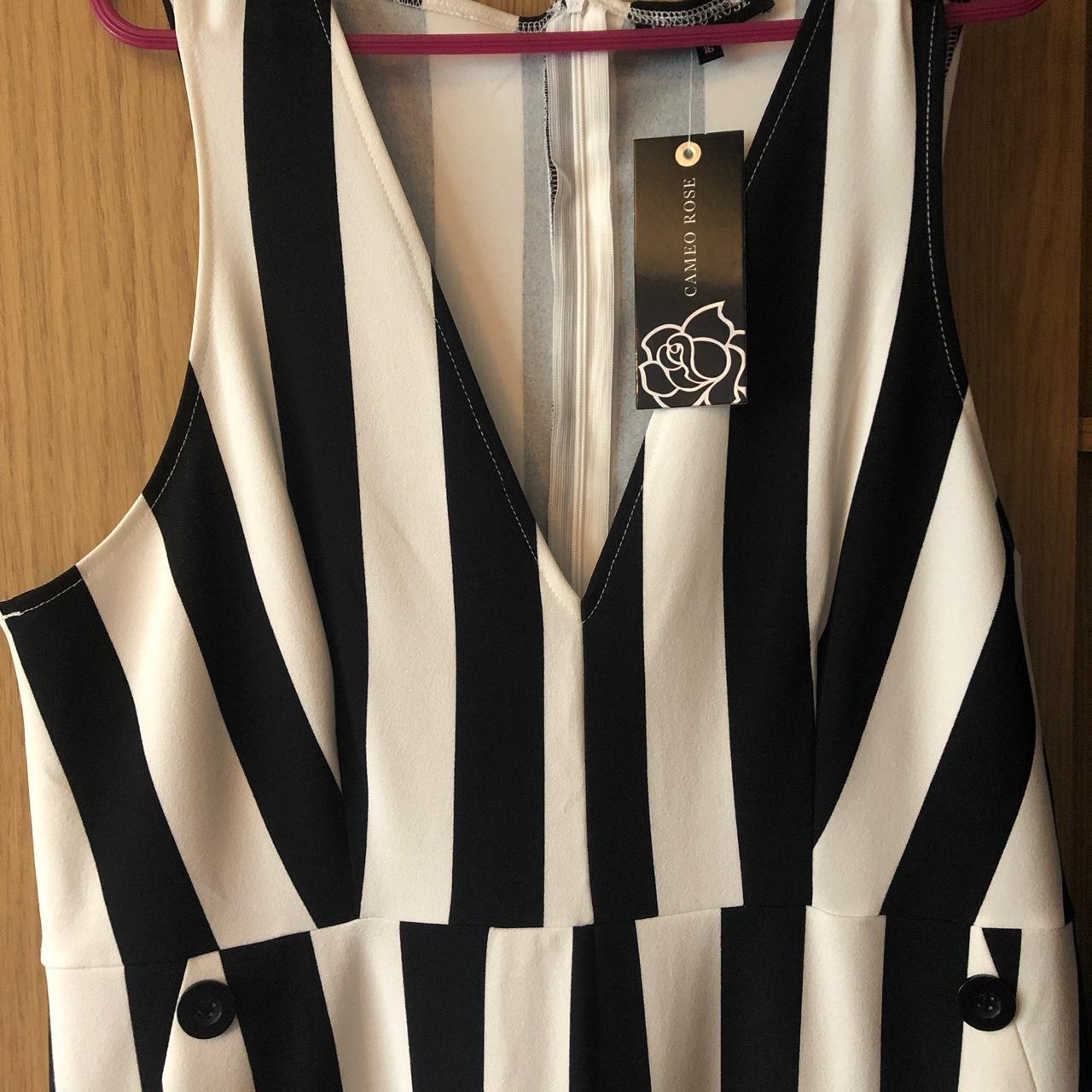 Brand new with Cameo rose black and