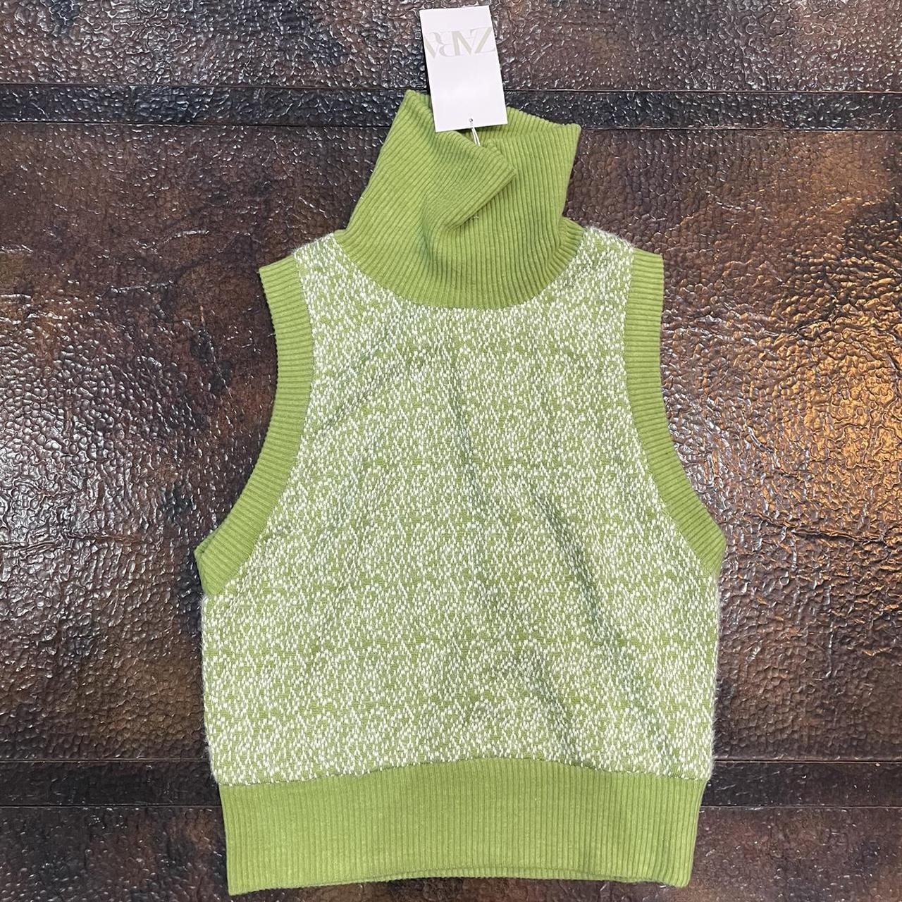green and white sweater vest