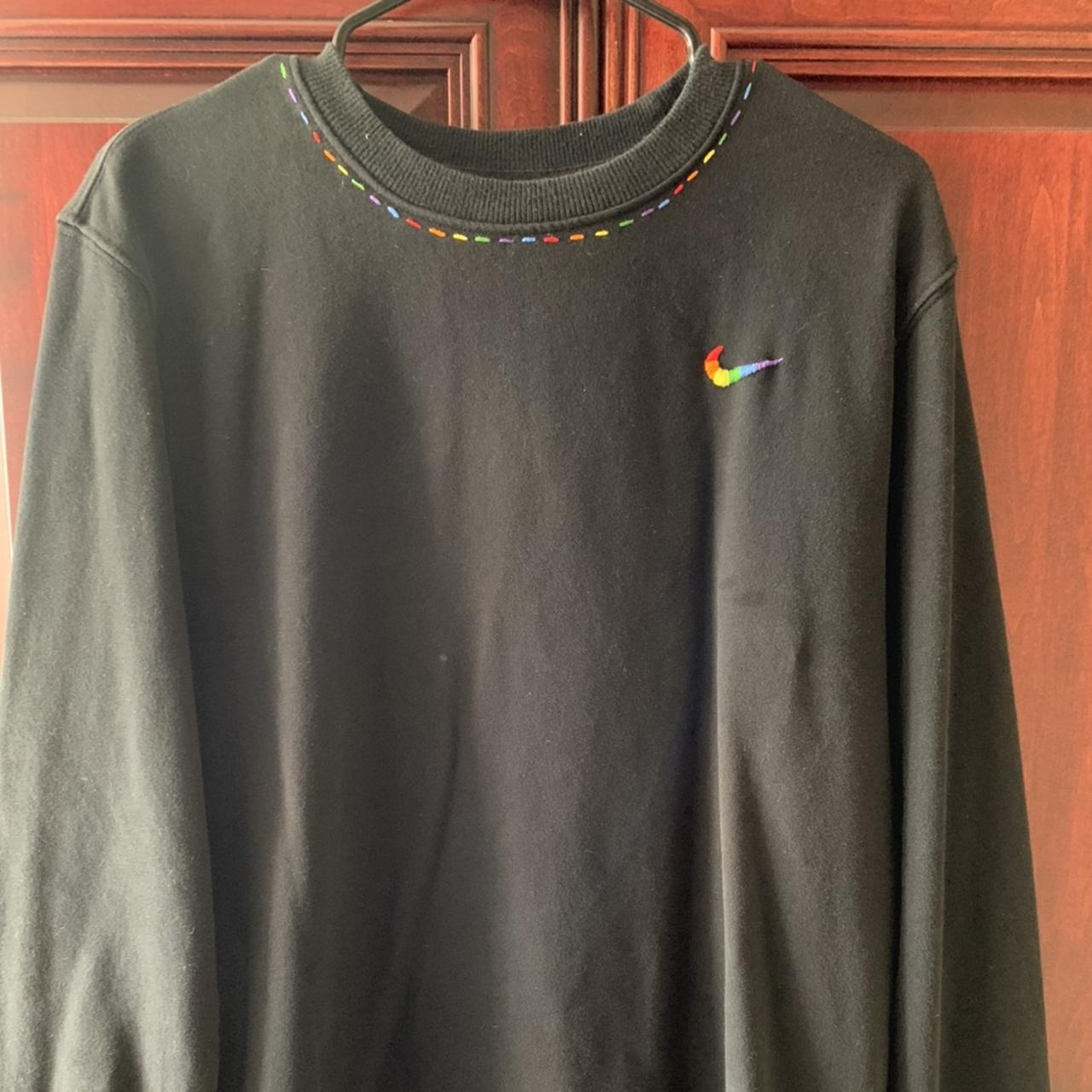 wearing a vintage nike crewneck with embroidered swoosh with