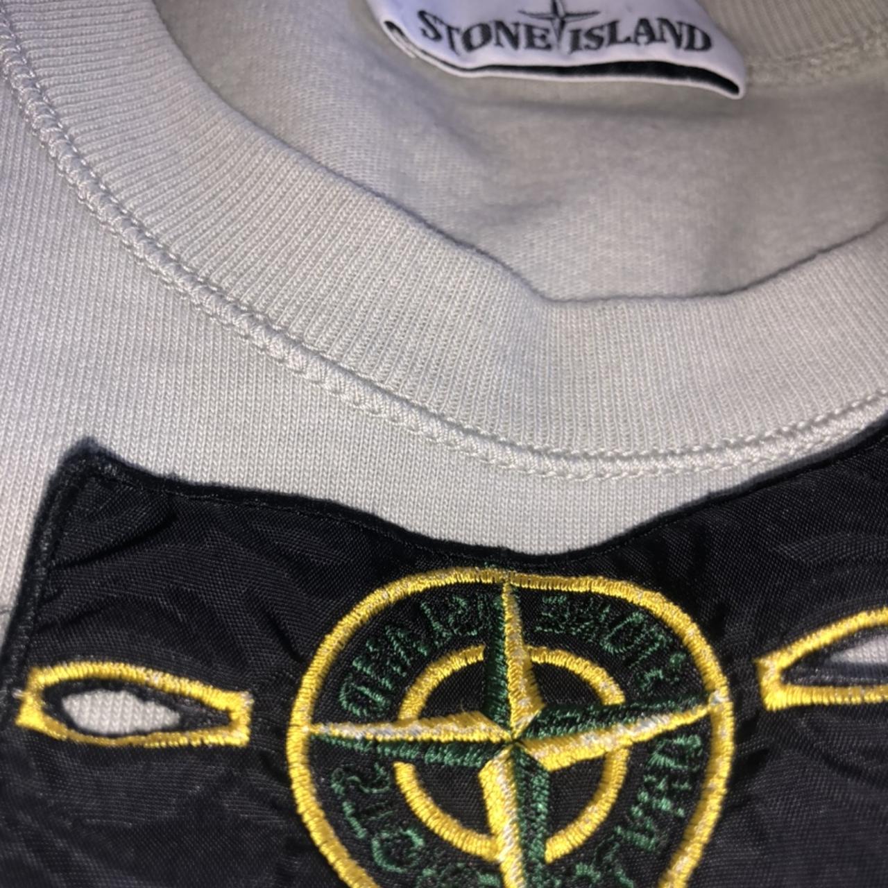 Stone island hotsell sweatshirt fake