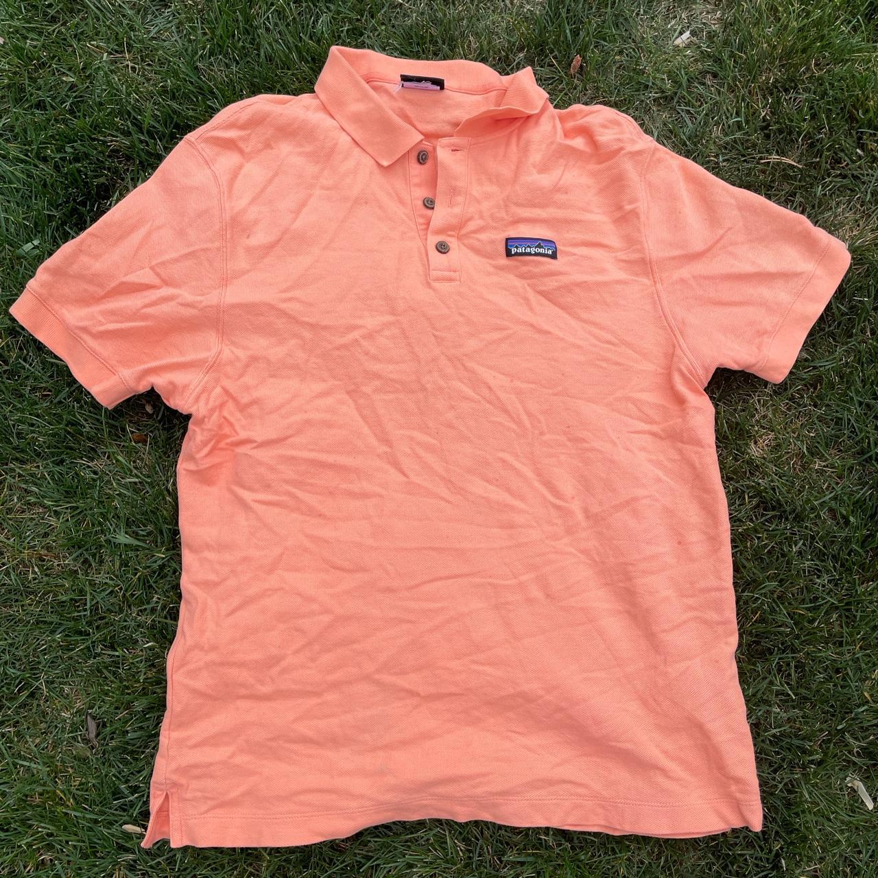 Cool like peachish orange Patagonia polo. Tags are... Depop