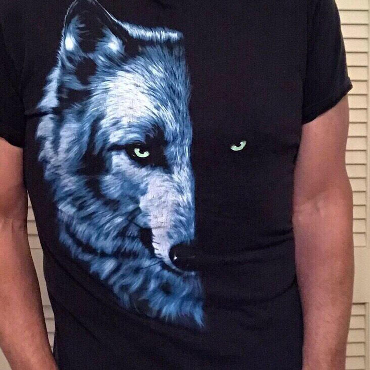 silver wolf with blue eyes howling