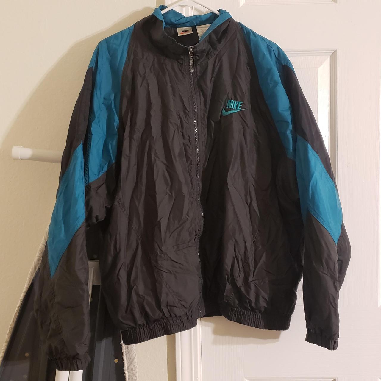 Selling a vintage Nike windbreaker in a teal green... - Depop