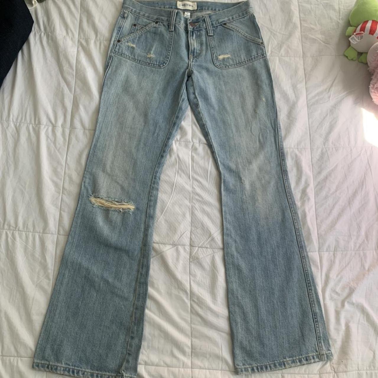 low rise ripped flare jeans! they have a front... - Depop