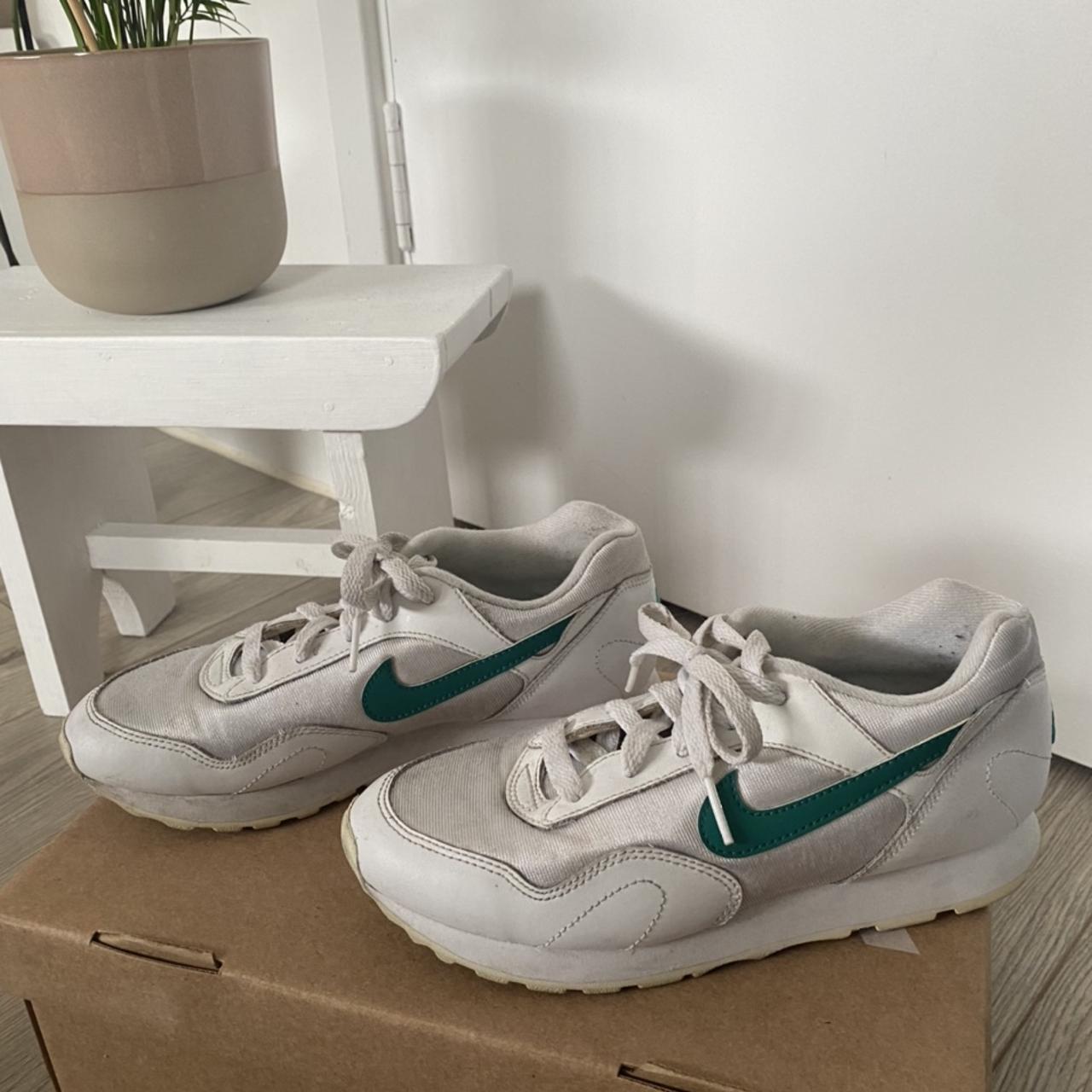 nike trainers with green tick