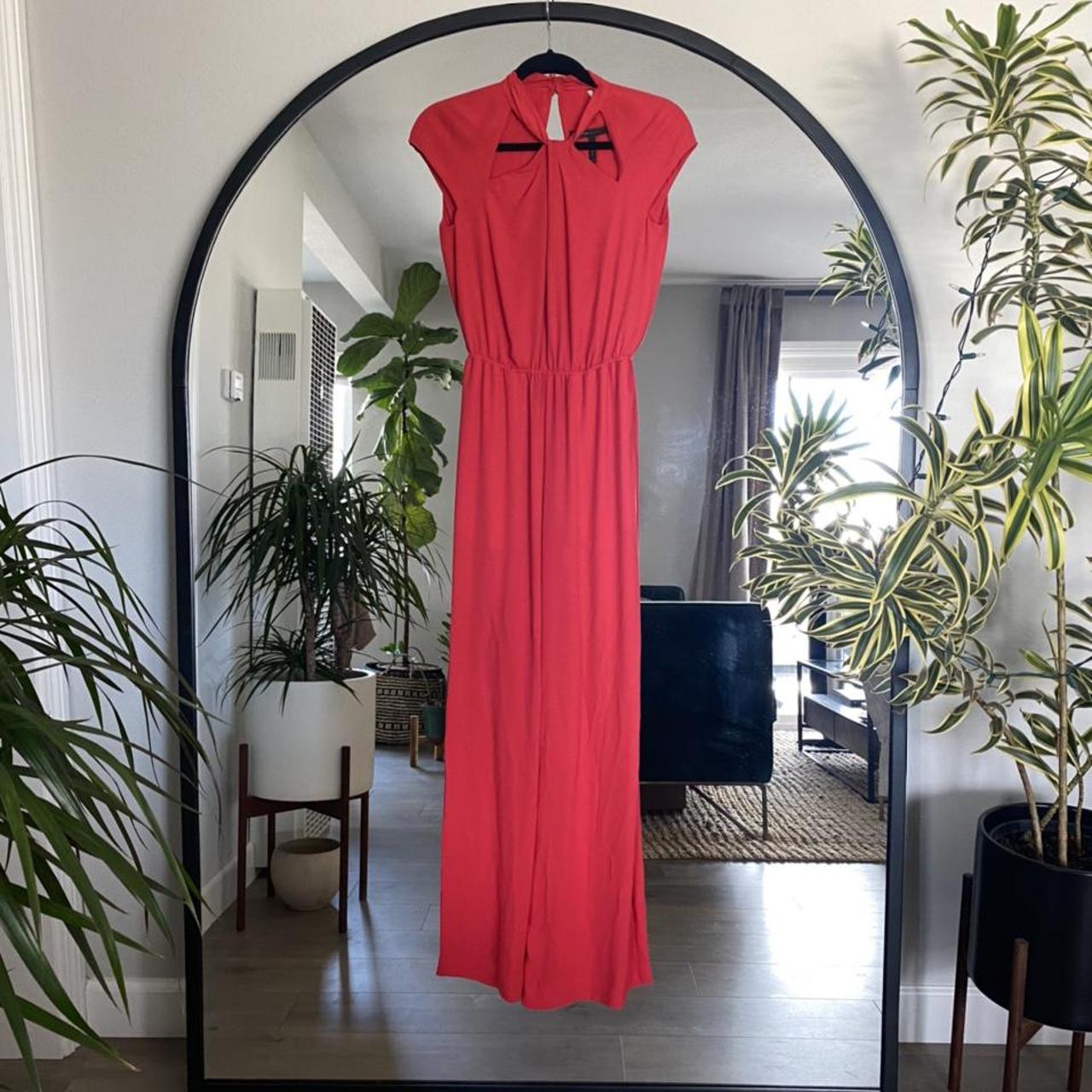 BCBG red jumpsuit. Flattering and flowy in size XXS