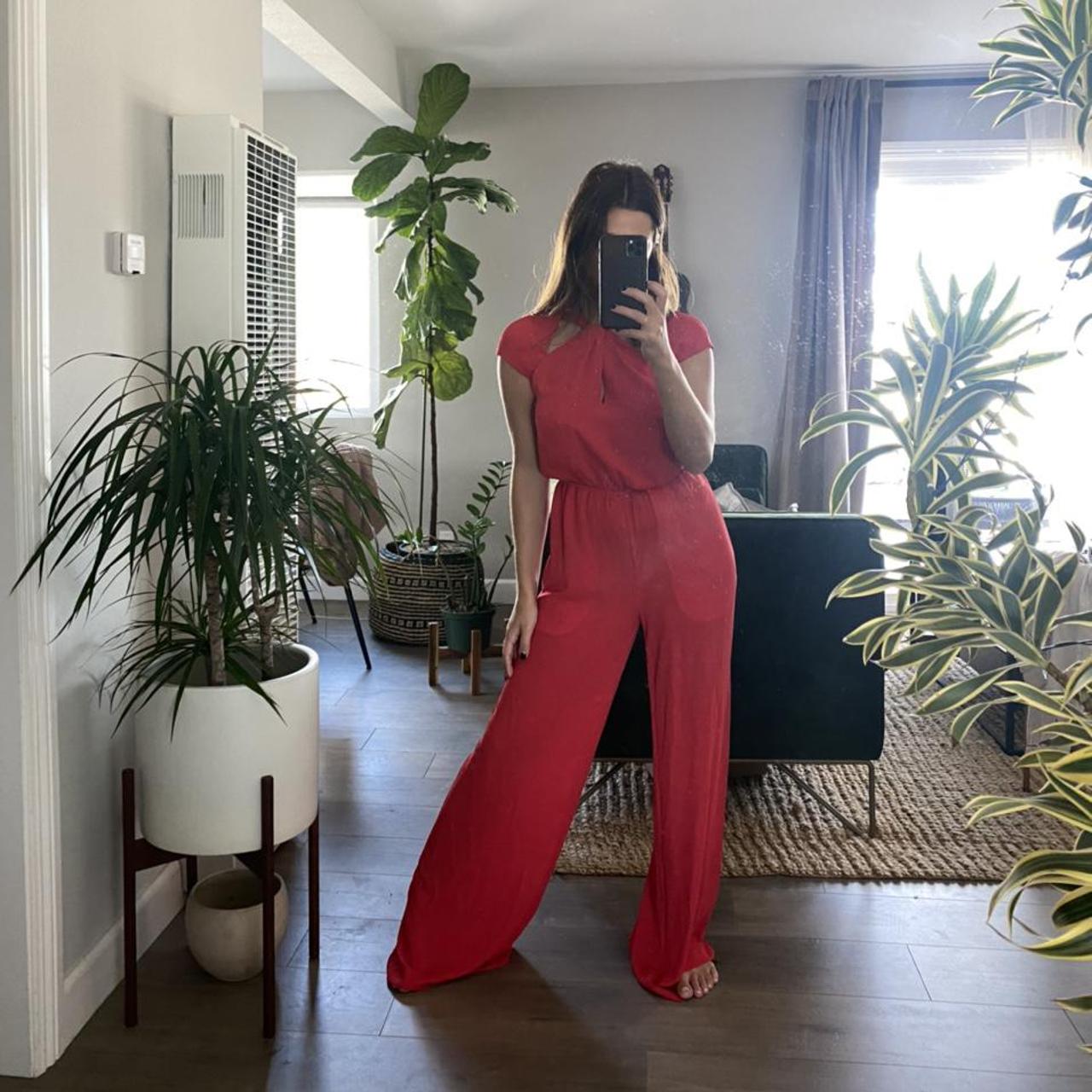 BCBG red jumpsuit. Flattering and flowy in size XXS