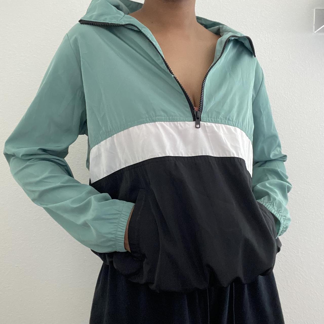 blue white and black quarter length zipup... Depop