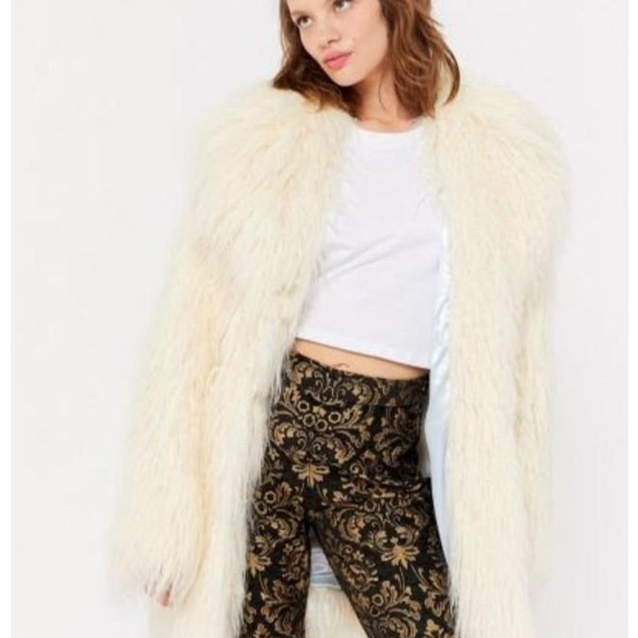 white shaggy fur coat