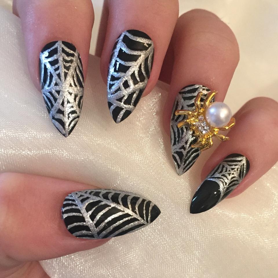 Black and silver stiletto nails with rhinestones and - Depop