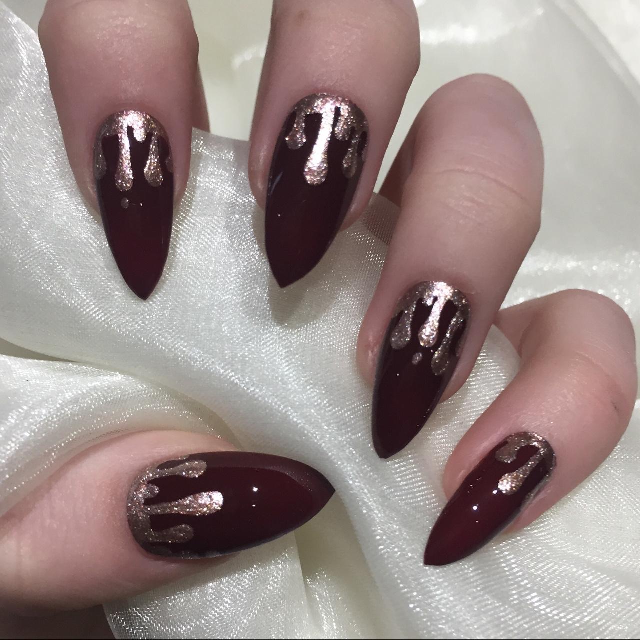 Burgundy stiletto nails with rose gold glitter drips... - Depop