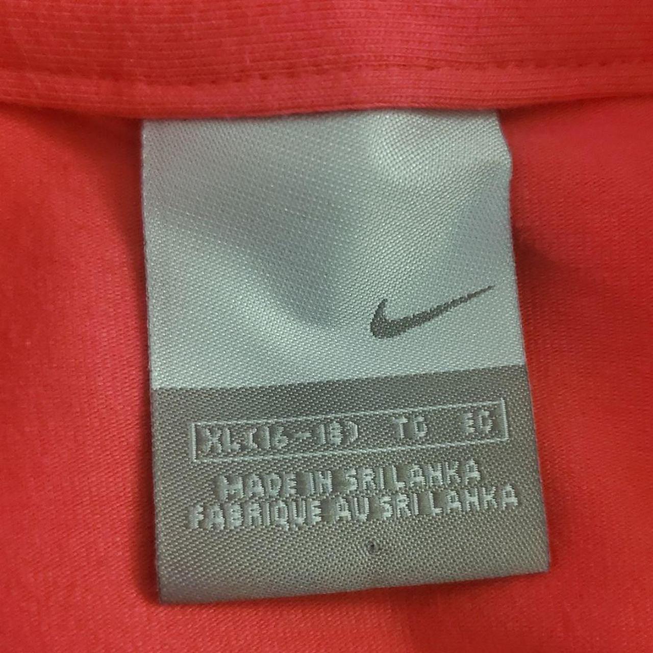 Nike brand xl hot pink short sleeved polo with black... Depop