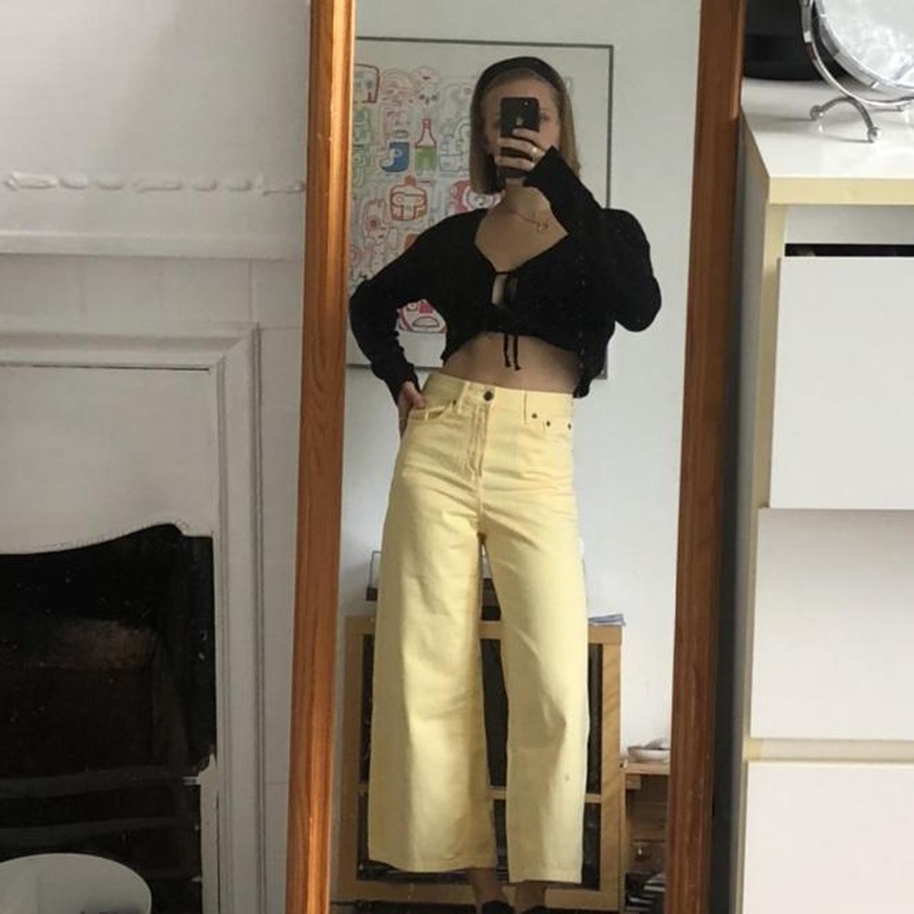 Such beautiful flared pastel yellow jeans! Very... Depop