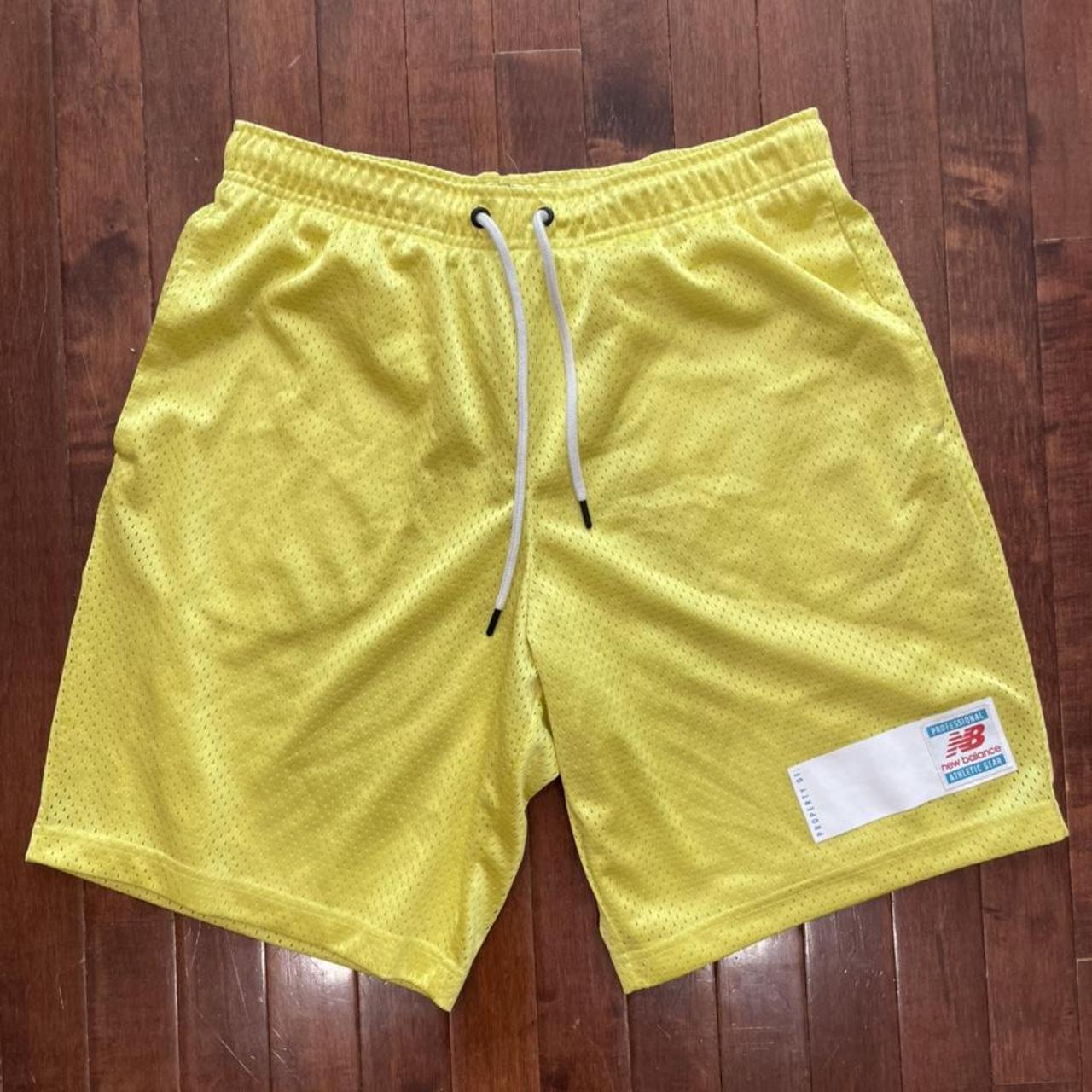 New Balance yellow mesh shorts Great condition... - Depop