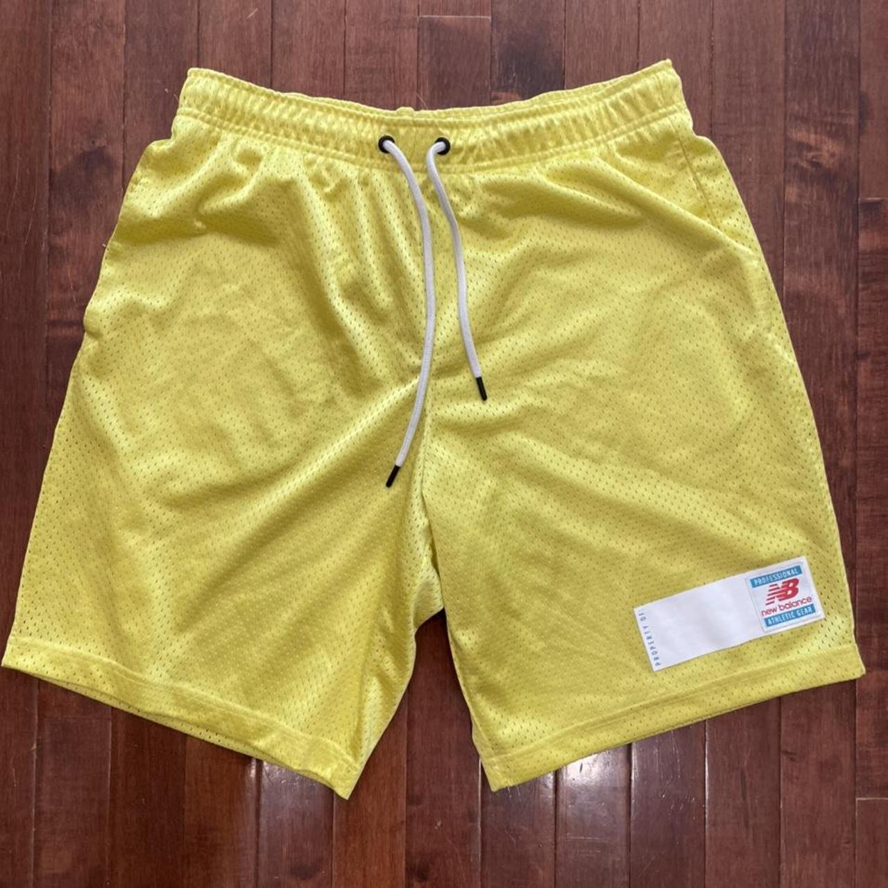 New Balance yellow mesh shorts Great condition... - Depop