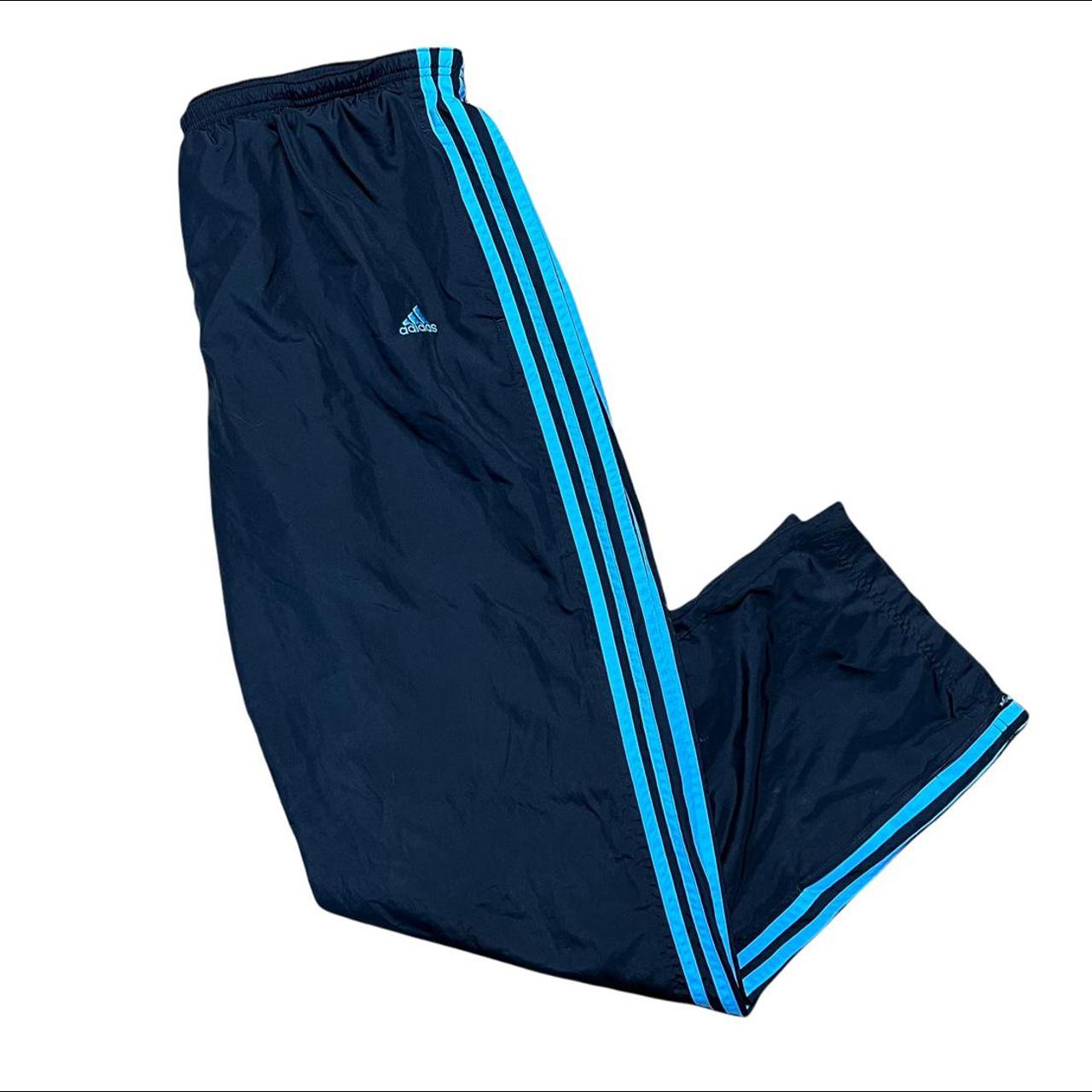 Vintage Black Adidas track pants, light blue stripe... - Depop