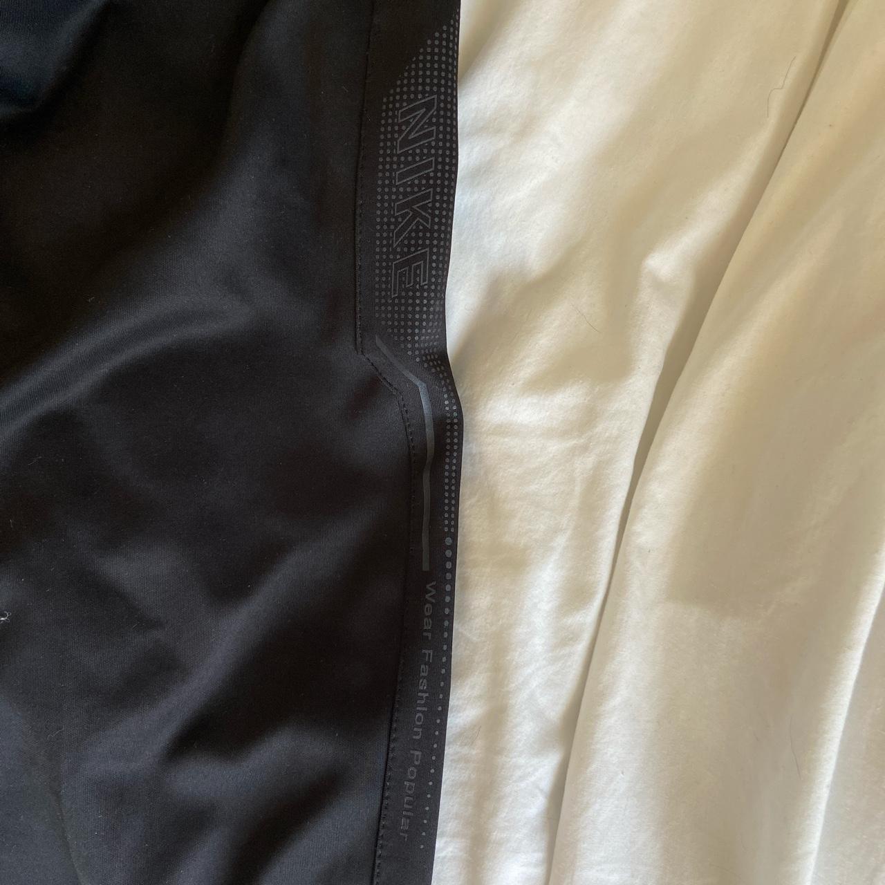 Black Nike trackies Has a cool design down the side... - Depop