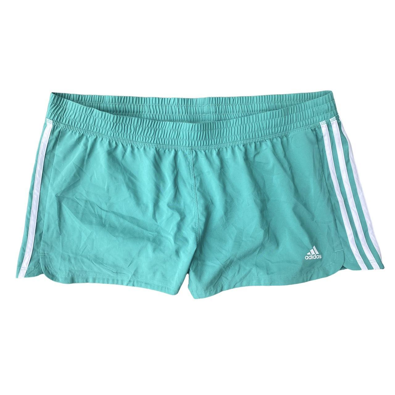 mint green adidas shorts