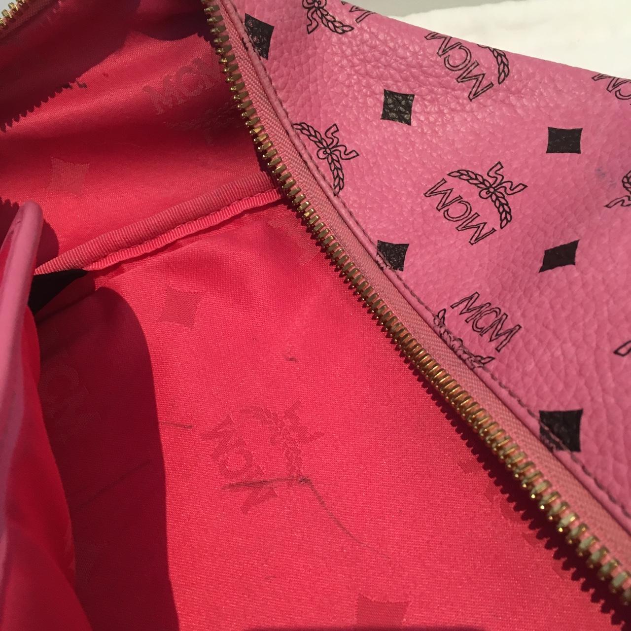 Pink/Gold MCM backpack, signs of wear evident inside - Depop