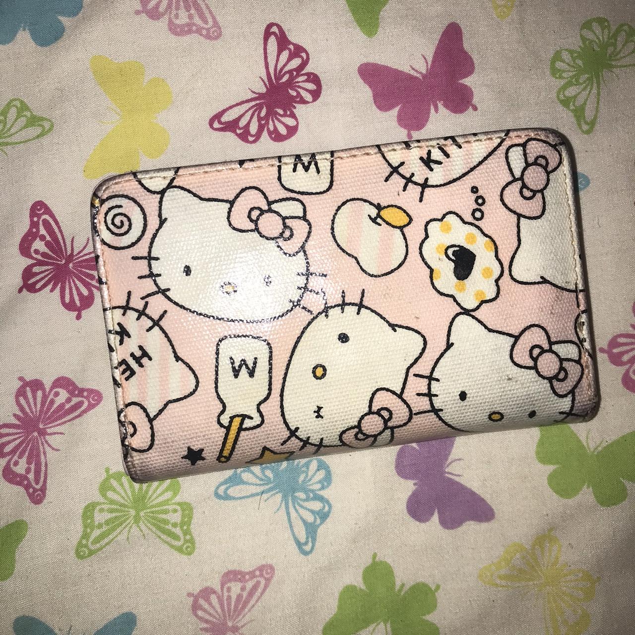 Pink hello kitty wallet. one broken zip :( i’m not... - Depop