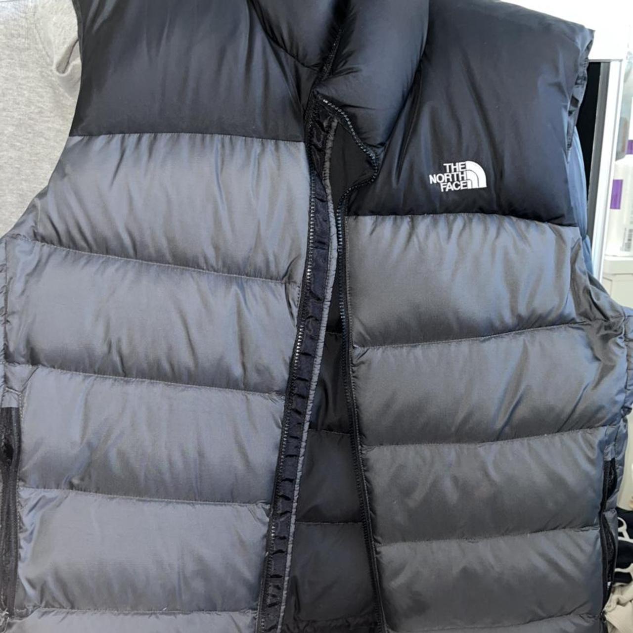 Grey north store face gilet