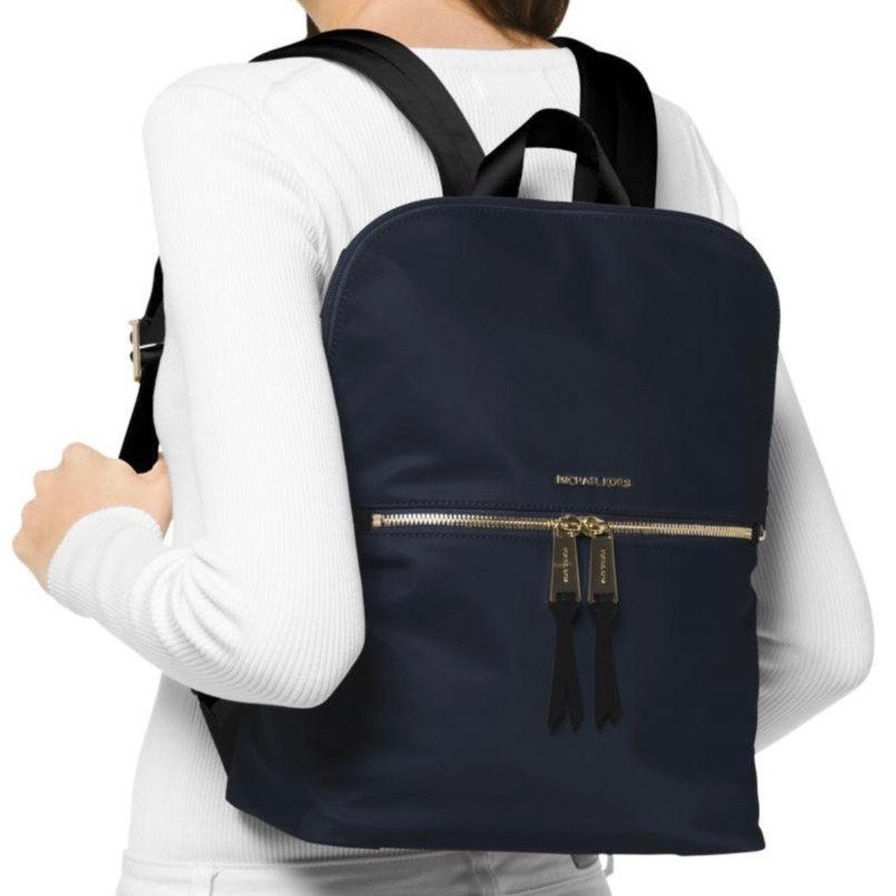 Michael kors 2024 navy blue backpack