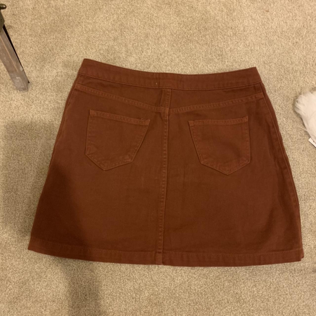 Brown denim skirt, only worn once, size 10. £10,... Depop